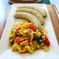 Ackee & Saltfish · Delicious Imported Ackee & Saltfish, stir fried and seasoned with authentic Jamaican spices.