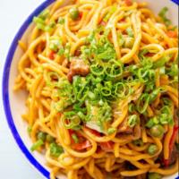 Chow Mein · Egg noodles, peppers, onions, green peas, pimento, soy