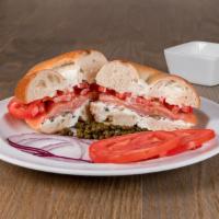 The Darien Sandwich · Norwegian smoked salmon, cream cheese, tomato, Bermuda onion, and capers.