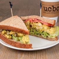 Curry Chicken Salad Sandwich · Lettuce and tomato.