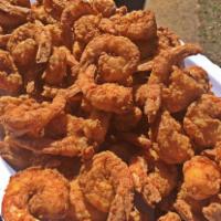 12 Pc Buttermilk Fried Shrimp · Comes with 2 signature sides . Add 1 Pc Fried Fish for additional charge.