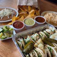 Taco Family Meal Deal · 20 Classic tacos toped with onions & cilantro, side of rice & beans, chips & salsa
serves at...