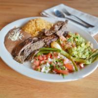 Arrachera Dinner · Grilled skirt steak served with pico de gallo, guacamole, grilled serrano peppers, serrano p...