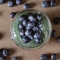 Berry Green Smoothie · Almond milk, carrot juice, blueberries, banana, kale, spinach, strawberries. This smoothie o...