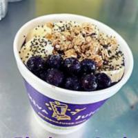 Acai Blueberry Bowl · Acai, apple juice, banana, blueberries blended together  atop a bottom layer of granola. A s...