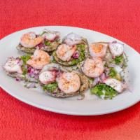 Ostiones Preparados  · Oysters on the 1/2 shell topped with shrimp, tomato, onion, cilantro and cucumber. Camaron, ...