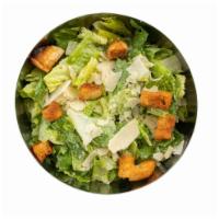 Caesar Salad · Hearts of Romaine, shaved Parmesan cheese and croutons tossed with classic Caesar dressing.