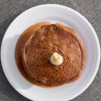 Pancakes · Homemade sweet cream pancakes made with cinnamon and vanilla served with butter and syrup, m...