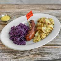 Bavarian   · On a plate with red cabbage, warm potato salad.