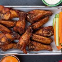 12 Pcs All Natural Wings · All natural (no hormones or antibiotics)  chicken wings cooked to perfection. Choose your fa...