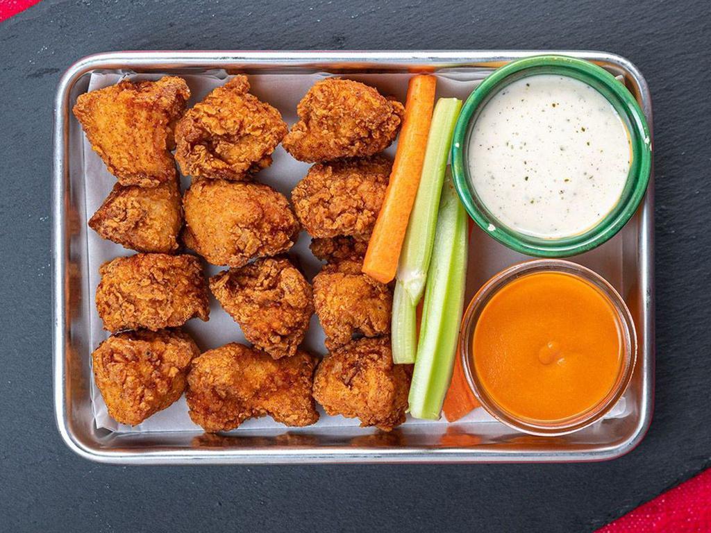 12 Pcs All Natural Boneless Wings · All natural (no hormones or antibiotics) breaded, boneless chicken wings cooked to perfection. Choose your favorite flavor and dipping sauce.