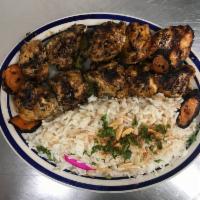 Shish Tawook Entree · 2 skewers. Char-broiled marinated chicken cubes and served with garlic sauce.