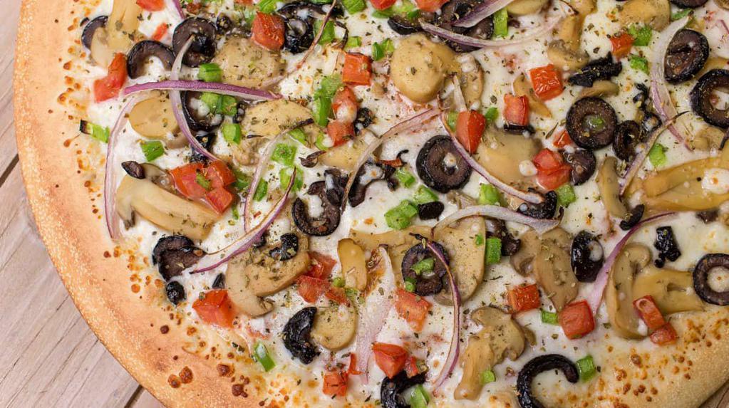 Veggie Deep Dish Pizza · Mushroom, green pepper, black olives, tomatoes, onion.