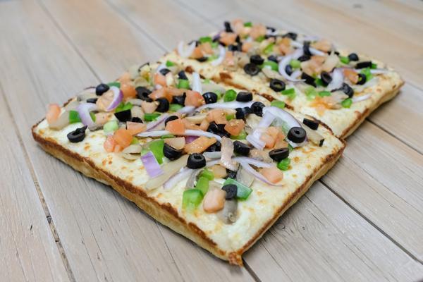 Veggie Deep Dish Pizza · Mushrooms, green peppers, black olives, tomatoes and onions.