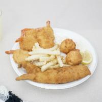 6 Pieces Shrimp and 2 Pieces Fish · Served With fries, Hush Puppies, Cole Slaw and/or Tatar sauce cocktail sauce