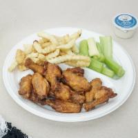 10 Piece Wings Combo · Served with fries, dressing and a drink.