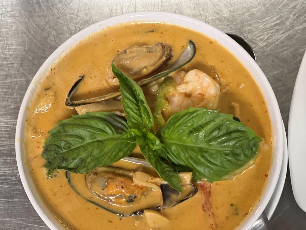 House Curry · Shrimp, chicken, tofu. garlic, ginger, lemongrass, red bell peppers, coconut milk, curry leaves, basil, cilantro.