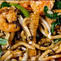 Teriyaki Udon · Udon noodles, ginger, rice wine, yellow onions, bell peppers, shiitake mushrooms, bean sprou...