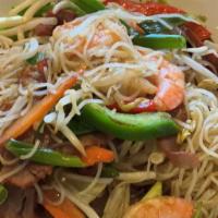 Singapore Mei Fun · Pork and shrimp. Stir-fried vermicelli noodles, curry powder, bean sprouts, carrot, celery, ...