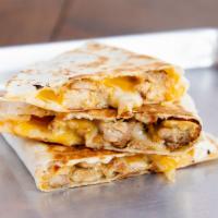 Kids Quesadilla · Protein & cheese. Sour cream on the side.