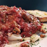 Penne with Red Sauce · Penne pasta served with our own Mama Mia's Red sauce. Add a meatball, our won Italian sausag...