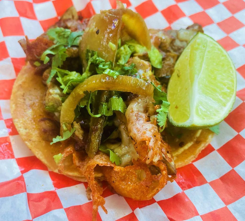 Alambre Style Taco · Choice of meat, cheese, bell pepper, grilled onion, cilantro and salsa.