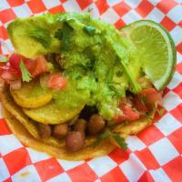 Vegetarian Taco · Squash, bell peppers, grilled onions, pinto beans, avocado, and salsa.