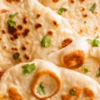 Plain Naan · House-made pulled and leavened dough baked to perfection in an Indian clay oven. Vegetarian.