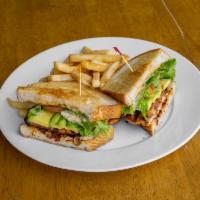Cajun Club Sandwich · Blackened chicken breast, smoked bacon, avocado, chipotle mayo, lettuce and tomato on a thic...