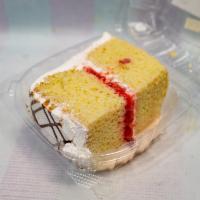 Vanilla Cake with Strawberry Filling  · Slice. 
