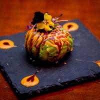Spicy Avocado Ball · Spicy tuna and tempura flakes wrapped in a bed of avocado with spicy mayonnaise and eel sauce.