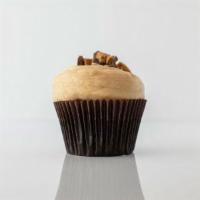 Peanut Butter Cup · Chocolate cake with peanut buttercream cheese frosting, topped with crumbled Reese's peanut ...