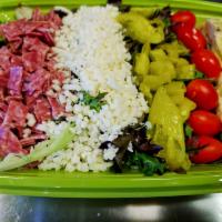 Antipasto Salad · Mixed greens , genoa salami, marinated artichoke hearts, mozzarella cheese, grape tomatoes, ...