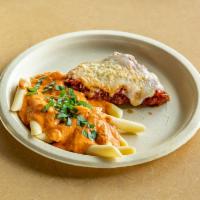 Chicken Parmesan & Penne · Chicken parmesan, marinara, parmesan with a penne pasta with alla vodka sauce.