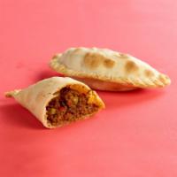 Beef Empanada · Peppers, onion, garlic, and spices.