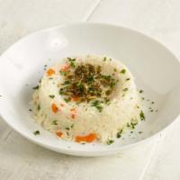 Gaucho Rice · Jasmine rice, chimichurri, carrots, and peas.