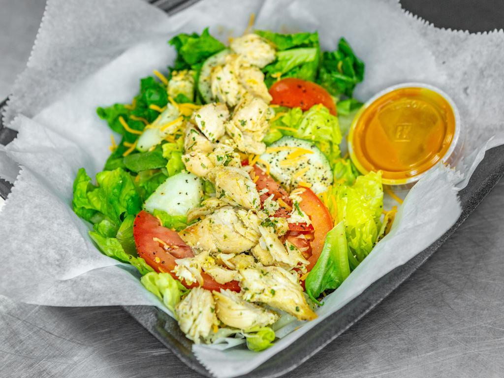 Chicken Salad · Grilled or fried chicken over lettuce, tomatoes, cheese, and cucumbers. Your choice of dressing.
