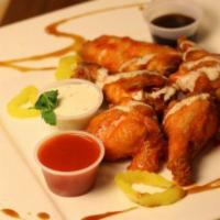 6 pc Chicken Wings · Crest Brand wings deep fried, then tossed in your choice of BBQ or Buffalo sauce.