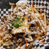Philly Fries · Grilled onions, bell peppers, mushroom, choice of meat (gyro or chicken), fries, mozzarella ...
