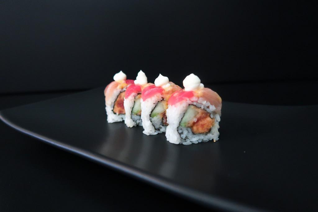 Red Rocks Roll · Spicy tuna, cucumber topped with tuna, yellow tail, spicy mayo.