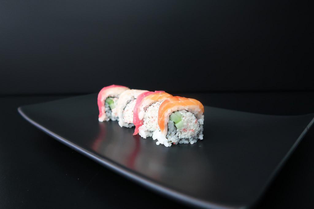 Rainbow Roll · Crab mix, cucumber topped with salmon, tuna yellowtail and avocado.