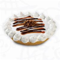 Caramel Turtle Treat Pie™ · Imagine your favorite pie. What’s in it? Pecans, fudge, caramel? You’d like some ice cream o...