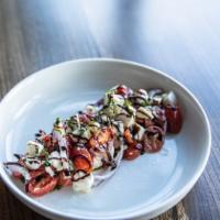 Caprese Salad · Tomato, red onion, fresh mozzarella, arugula pesto, sea salt (GF)