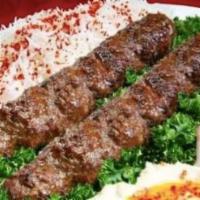 Iraqi Kofta kabab Plate · Iraqi Kofta kabab mixed with parsley onion, and garlic. Served with rice, and a side of salad.