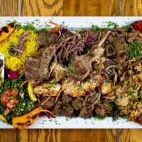 Super Deluxe Mixed Grill · Two skewers of each Chicken kabab, Lamb kabab and Kofta kabab. Two lamp chops, 4 oz of chick...