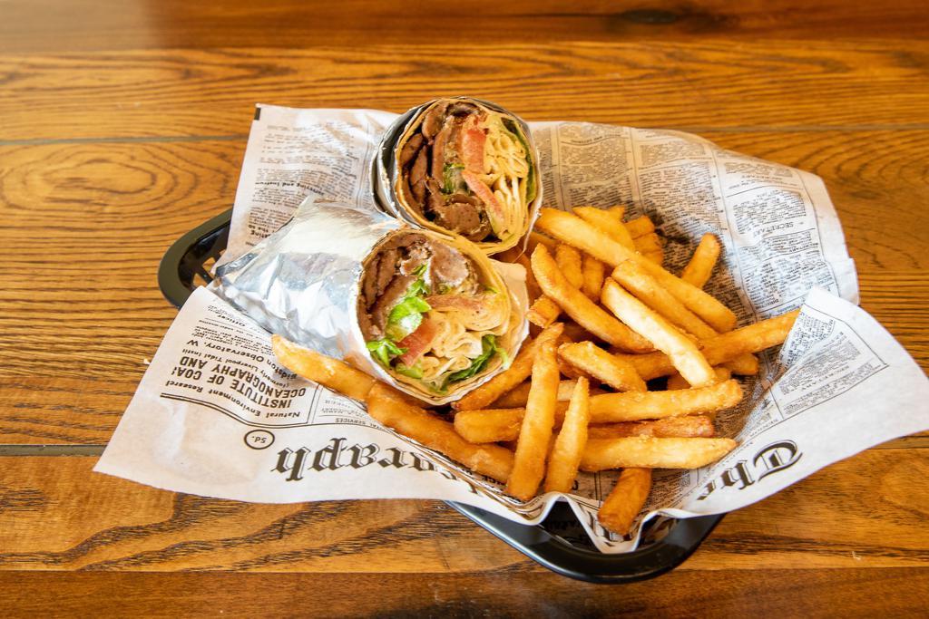  Gyro with fries · Greek gyro meat, tomatoes, onion, lettuce, tzatziki sauce, wrapped in Pita bread. No fires added
