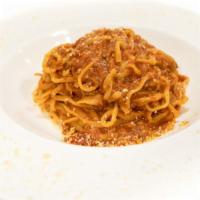 Spaghetti Bolognese · Slow-cooked house-made meat ragout.