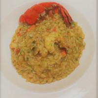 Risotto al'Aragosta e Asparagi · Lobster and asparagus.