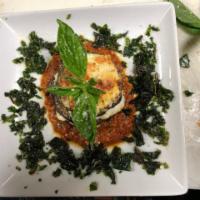 Parmegiana di Melanzane · Eggplant, ricotta, spinach, garlic, and olive oil.