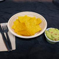 Tortilla Chips and House Made Guacamole · 
